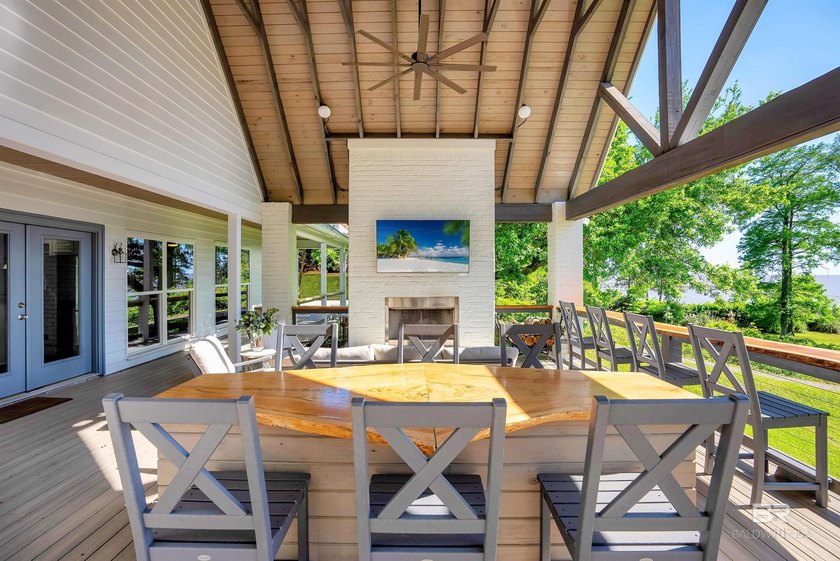 This exquisite bayfront residence features 1.22 acres along the - photo 15