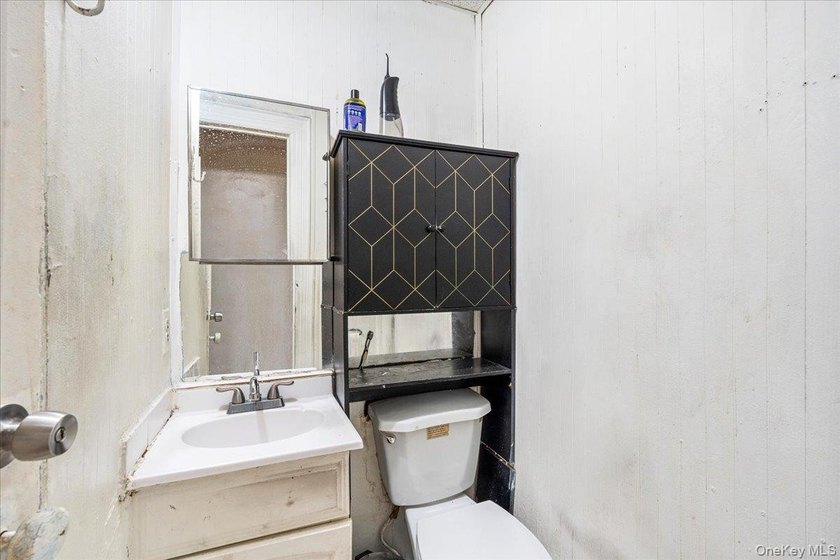Welcome to this well-maintained 2-family brick home located in - photo 15
