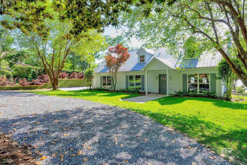 This exquisite bayfront residence features 1.22 acres along the - photo 16