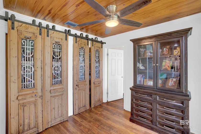 This exquisite bayfront residence features 1.22 acres along the - photo 22