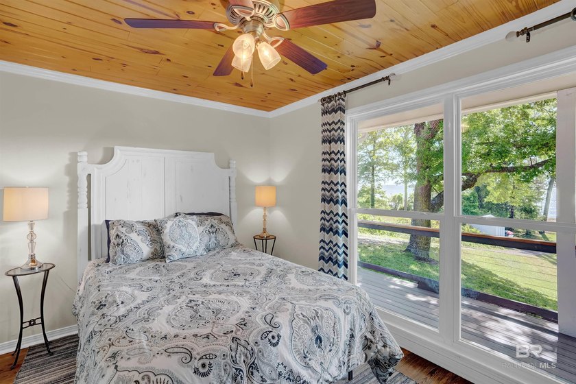 This exquisite bayfront residence features 1.22 acres along the - photo 27