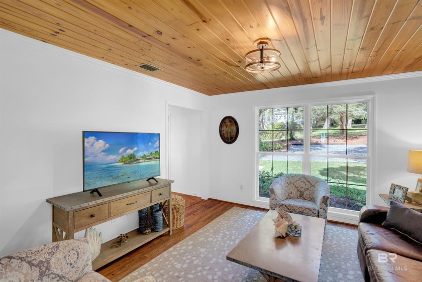 This exquisite bayfront residence features 1.22 acres along the - photo 28