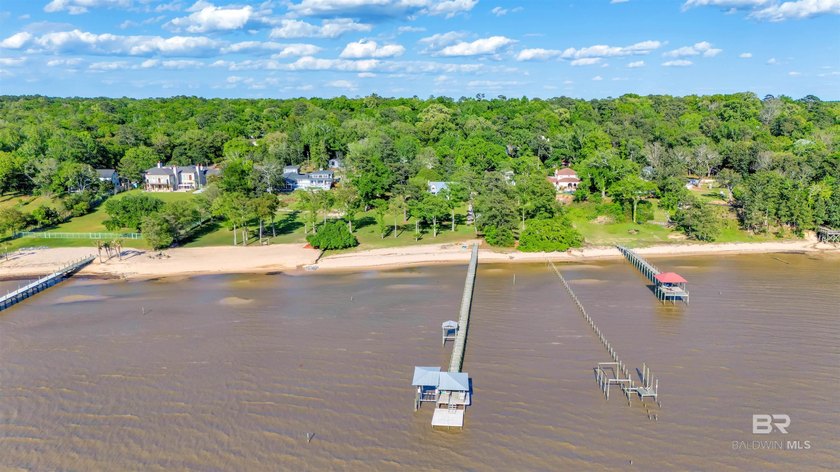 This exquisite bayfront residence features 1.22 acres along the - photo 30