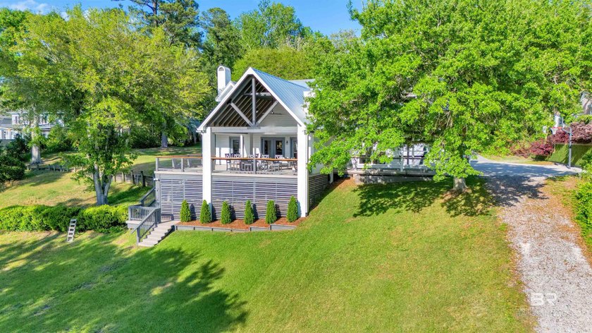 This exquisite bayfront residence features 1.22 acres along the - photo 31