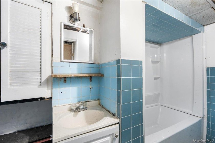 Welcome to this well-maintained 2-family brick home located in - photo 32