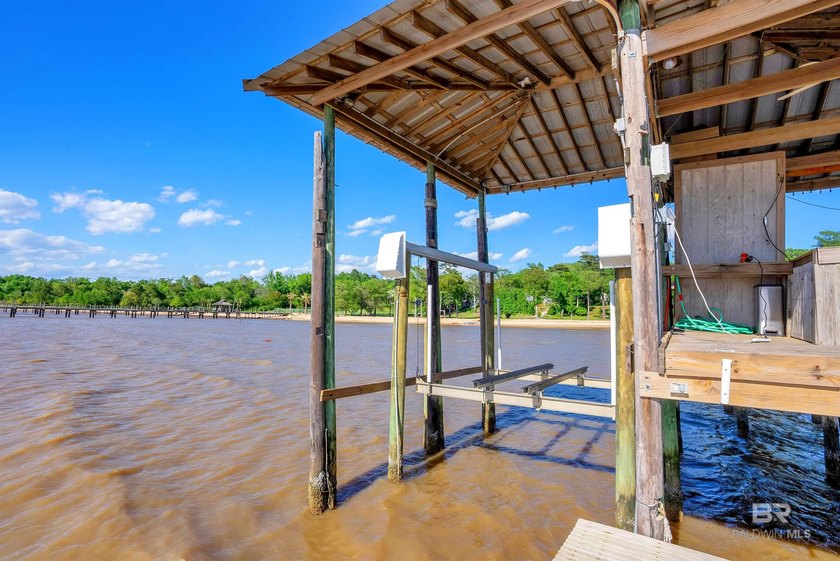 This exquisite bayfront residence features 1.22 acres along the - photo 35