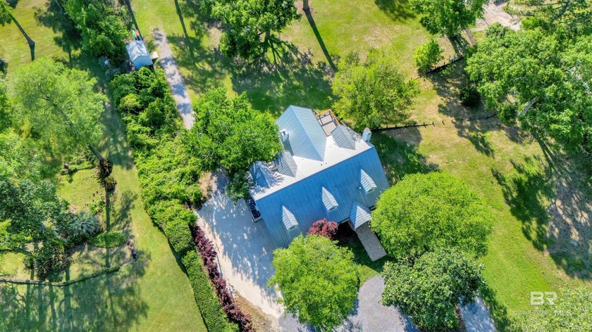 This exquisite bayfront residence features 1.22 acres along the - photo 37