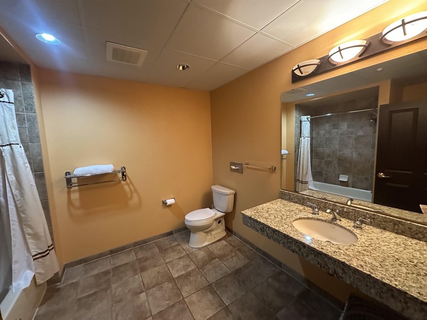 Located on the sixth floor, this spacious three bedroom condo - photo 15