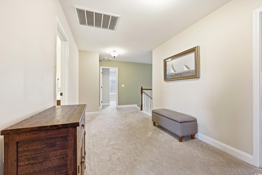 Discover exceptional coastal living in this immaculate 4-bedroom - photo 19