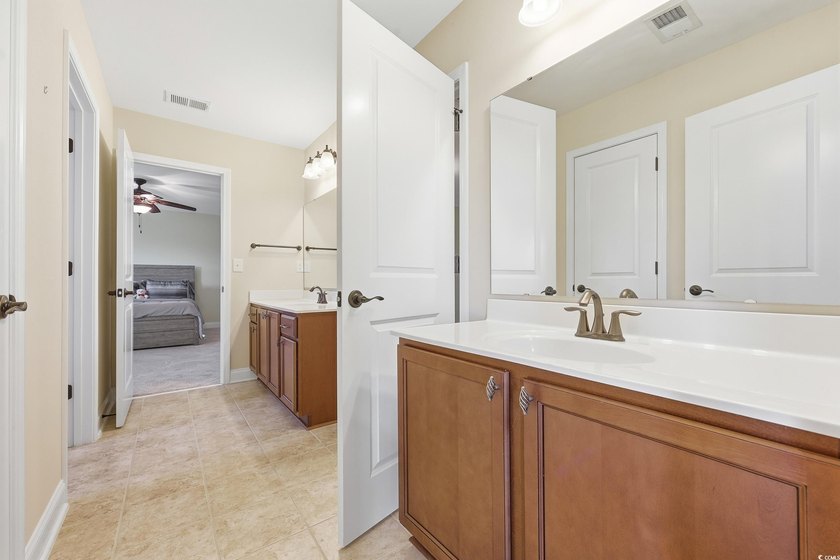 Discover exceptional coastal living in this immaculate 4-bedroom - photo 25