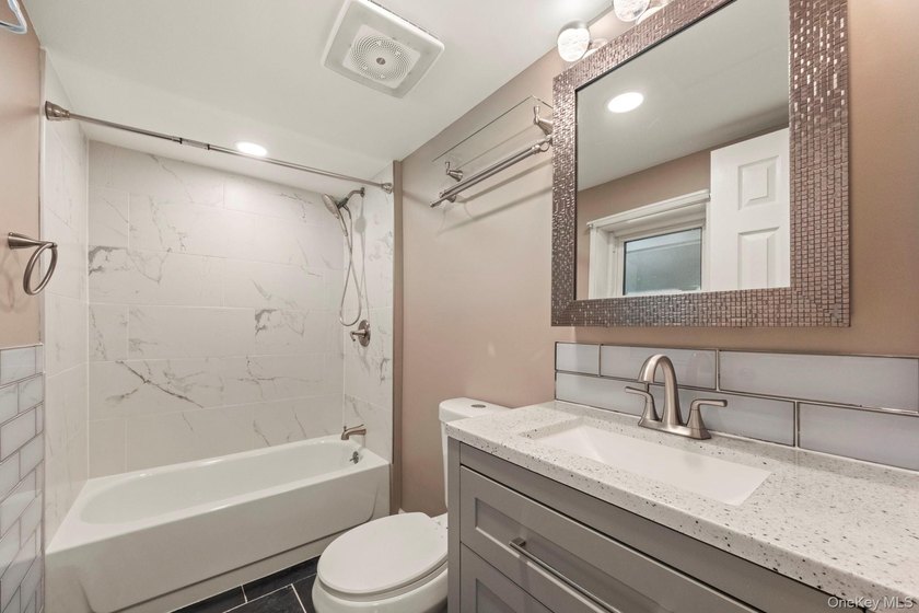 Tucked away on a beautifully wooded and private lot, this - photo 28