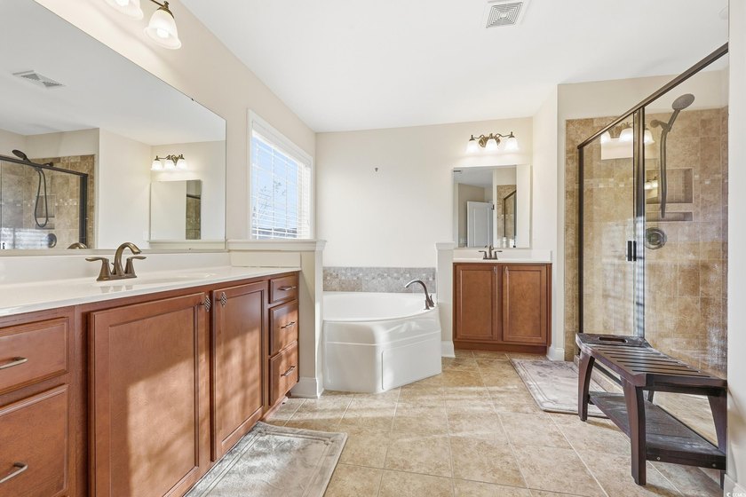 Discover exceptional coastal living in this immaculate 4-bedroom - photo 31