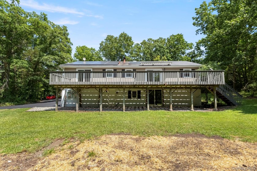 Tucked away on a beautifully wooded and private lot, this - photo 37