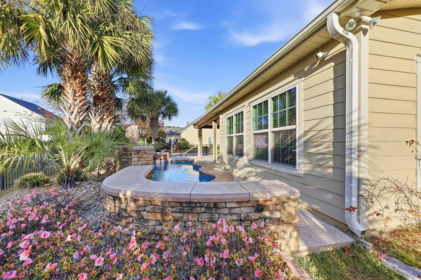 Discover exceptional coastal living in this immaculate 4-bedroom - photo 38