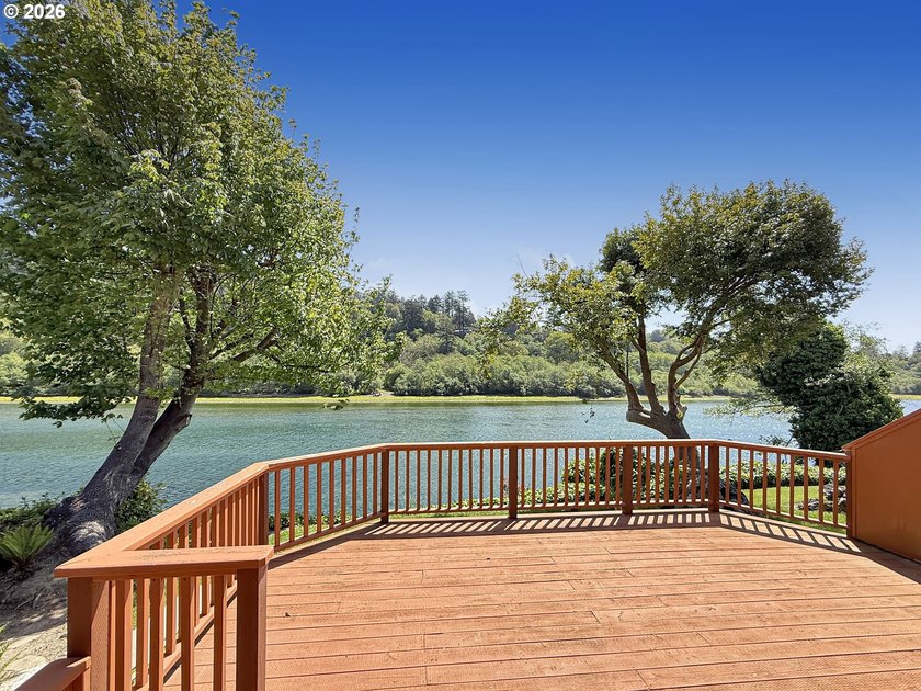 RIVERFRONT living in this beautifully maintained 2-bedroom cabin - photo 15