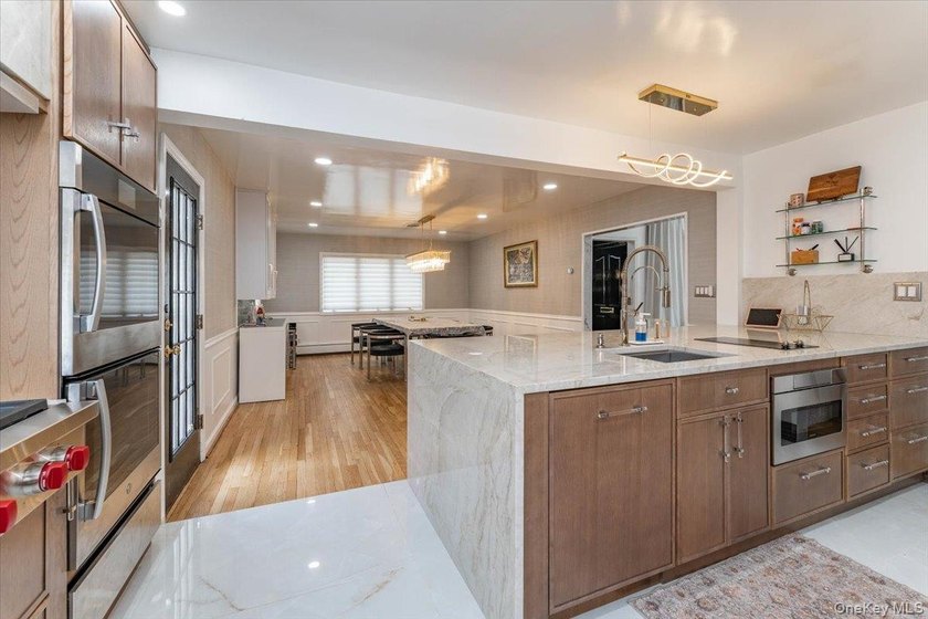 Welcome to this stunning 6-bedroom, 3.5-bath home on a beautiful - photo 9