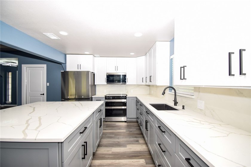 Completely rebuilt and beautifully updated, this move-in ready - photo 12