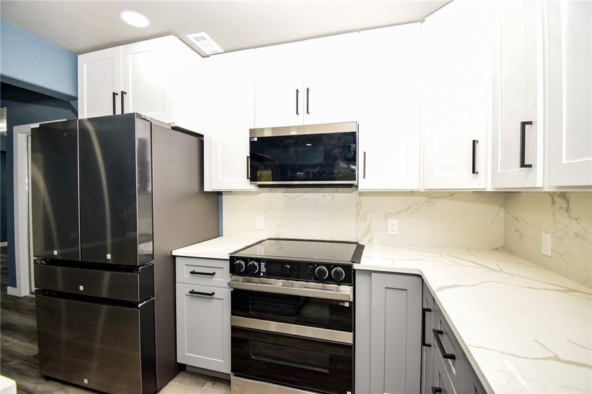 Completely rebuilt and beautifully updated, this move-in ready - photo 13