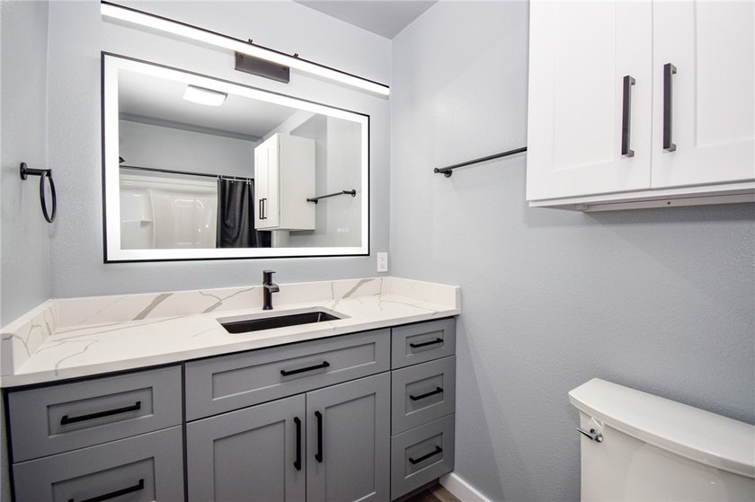 Completely rebuilt and beautifully updated, this move-in ready - photo 19