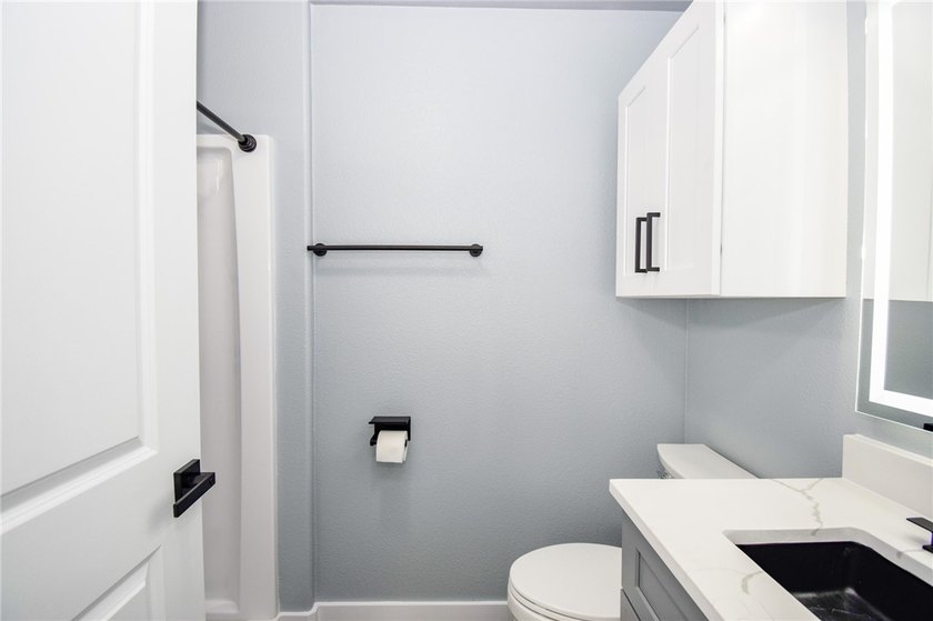 Completely rebuilt and beautifully updated, this move-in ready - photo 24