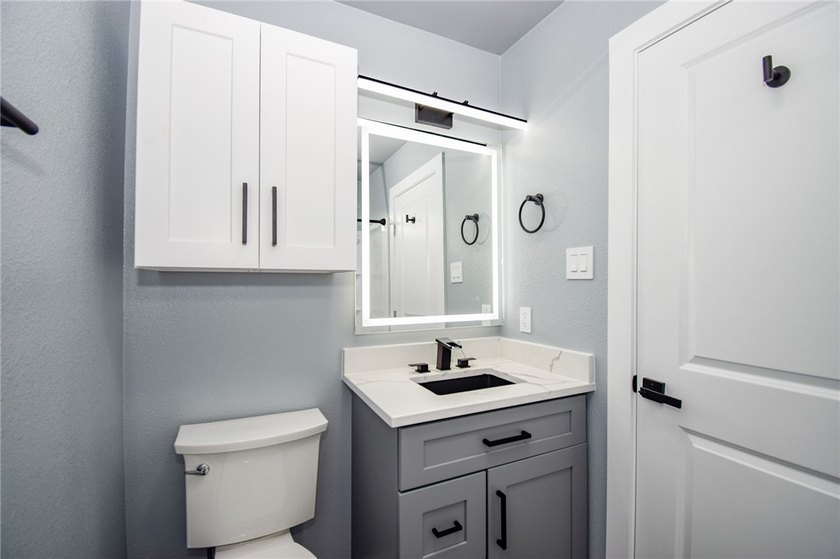 Completely rebuilt and beautifully updated, this move-in ready - photo 27