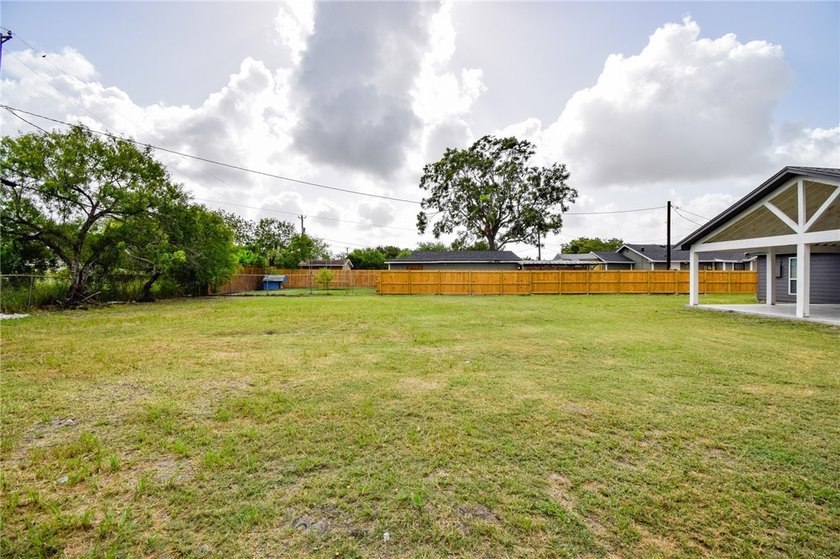 Completely rebuilt and beautifully updated, this move-in ready - photo 31
