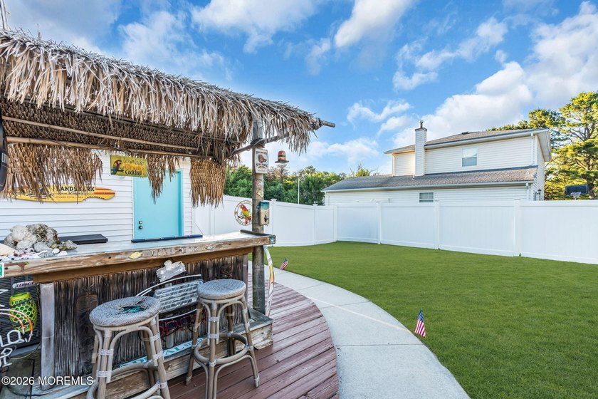 Welcome to this charming 3-bedroom, 1.5-bath colonial in the - photo 49