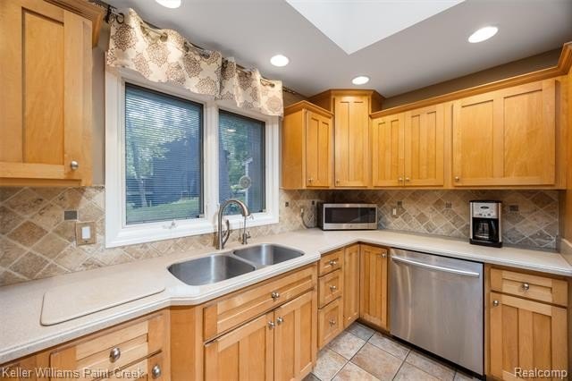 Welcome to 7148 Deerhill Drive! This striking contemporary ranch - photo 11