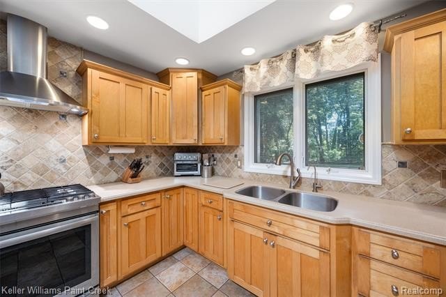 Welcome to 7148 Deerhill Drive! This striking contemporary ranch - photo 13