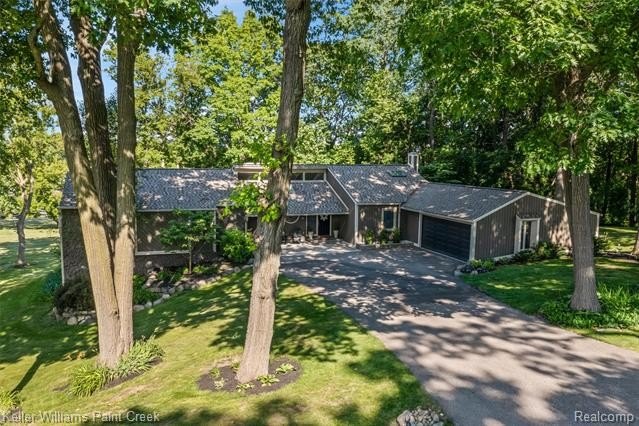 Welcome to 7148 Deerhill Drive! This striking contemporary ranch - photo 42