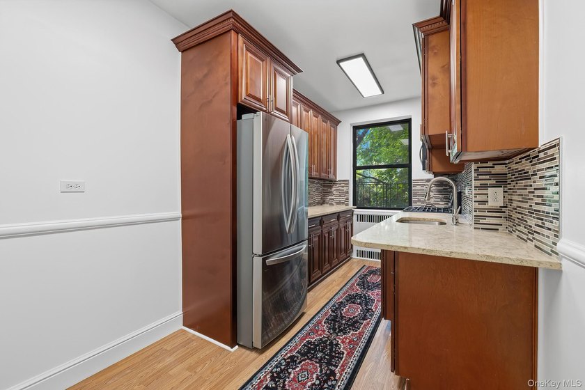 This is a prewar Mid-rise elevator building built in 1914. Unit - photo 11