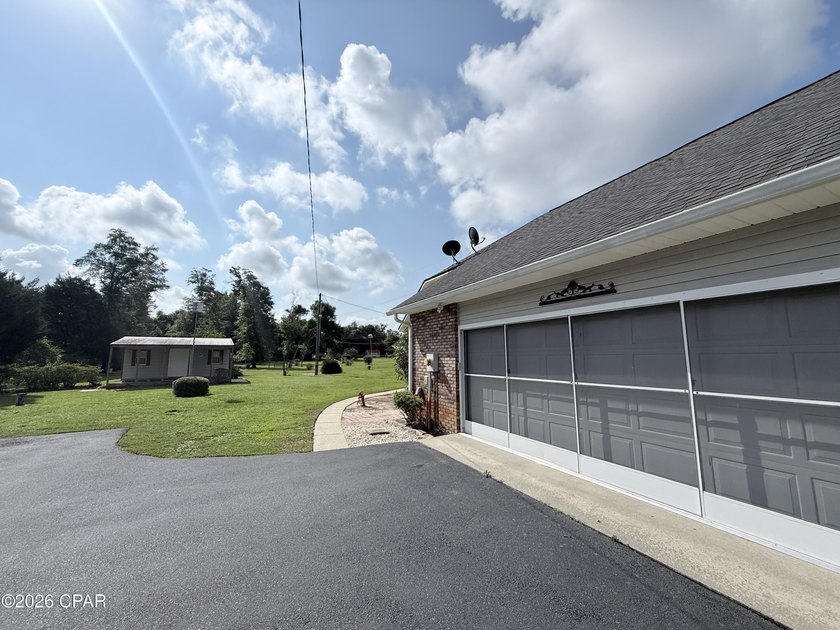 Welcome home to this spacious 3-bedroom, 2-bath brick home - photo 3