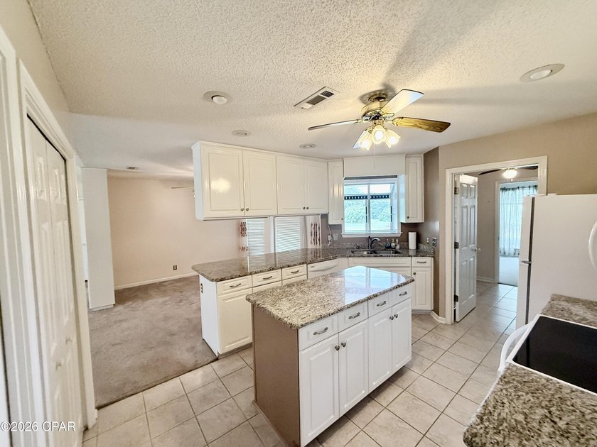Welcome home to this spacious 3-bedroom, 2-bath brick home - photo 10