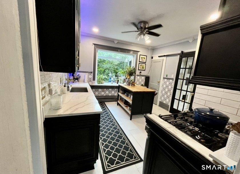 This beautifully restored historic home blends timeless - photo 4