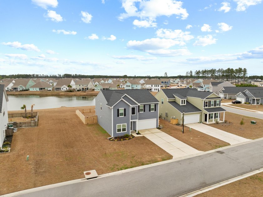Hard-to-find 5 bedroom home in Cane Bay with pond views, added - photo 18