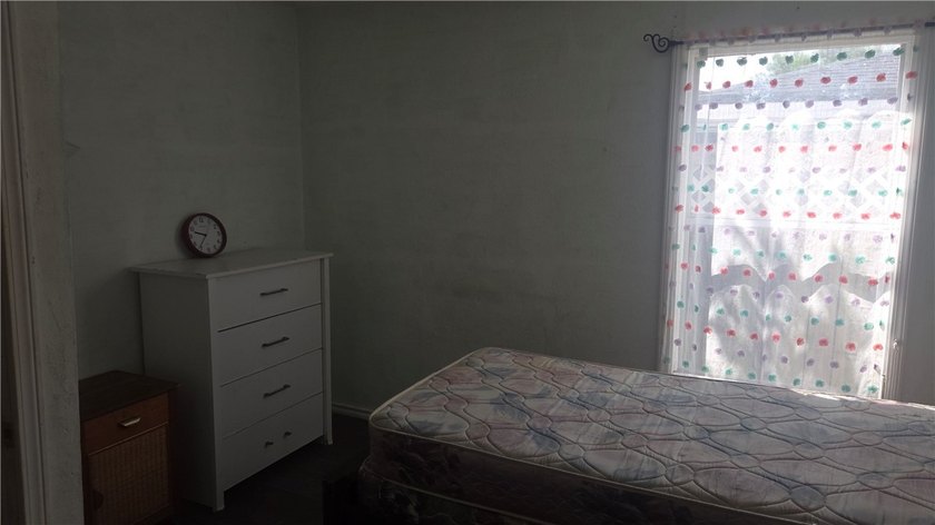 INVESTMENT OPPORTUNITY!! Main house is 4 Bedrooms and 1 Bath and - photo 16