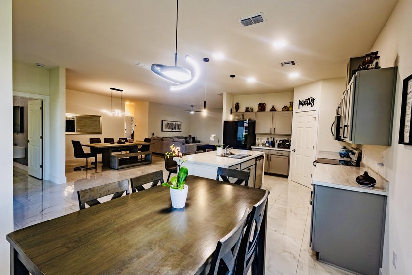 Now $519,900 + $10,000 seller credit! This 2024-built 4-bedroom - photo 17