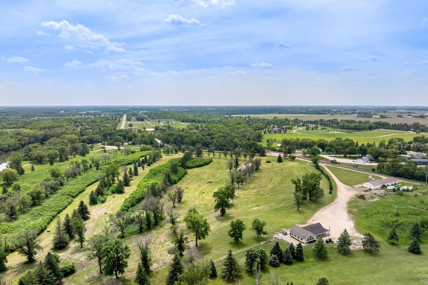 This expansive 30+ acre property offers a versatile canvas for - photo 2