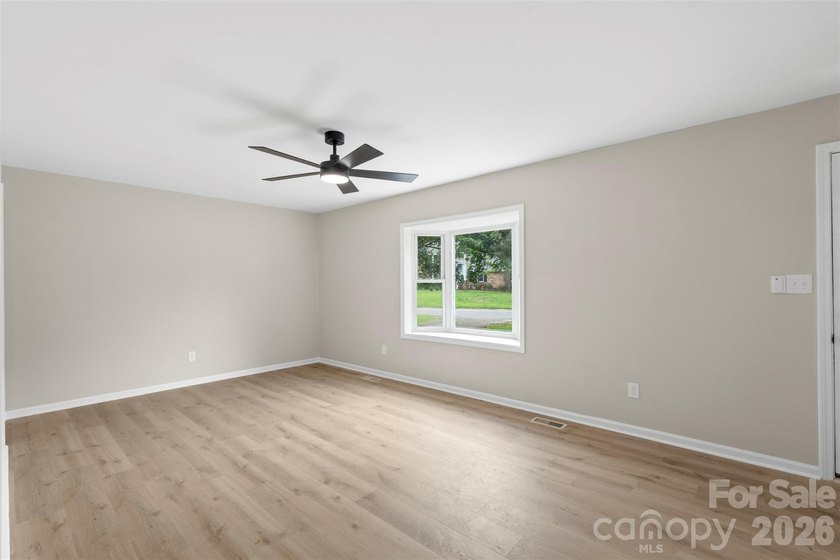 Welcome home to this recently renovated 4-bedroom property - photo 8