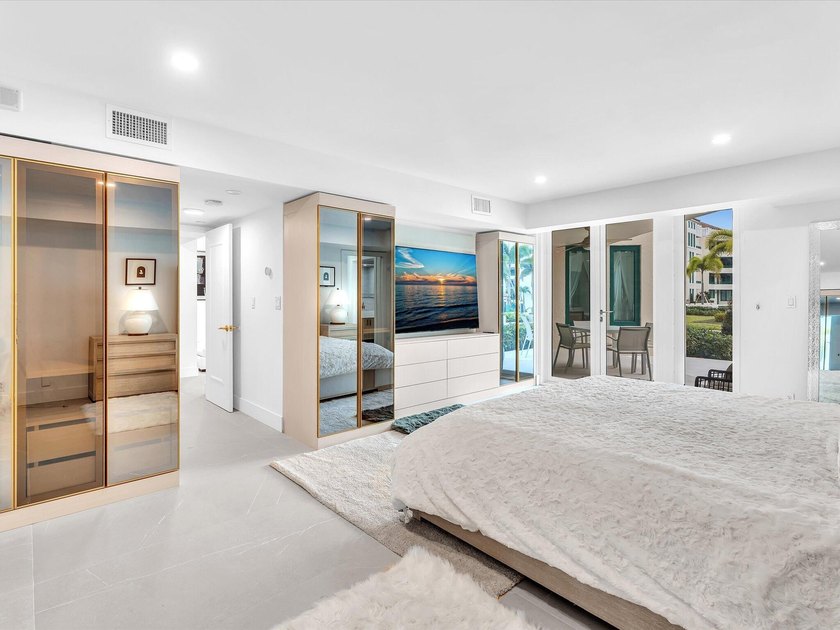 Welcome to luxury waterfront living in downtown Boca. This - photo 11