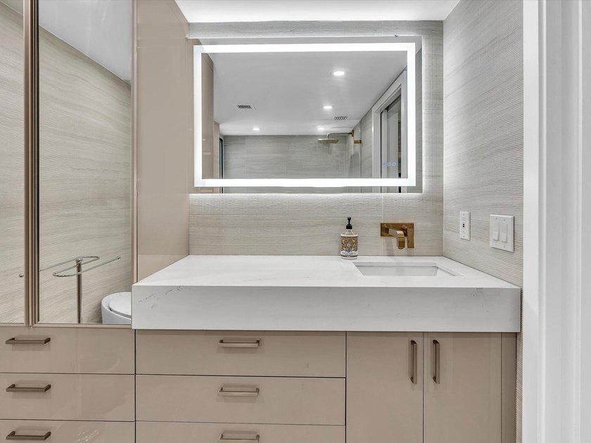 Welcome to luxury waterfront living in downtown Boca. This - photo 13
