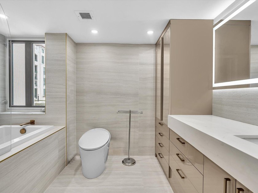 Welcome to luxury waterfront living in downtown Boca. This - photo 14