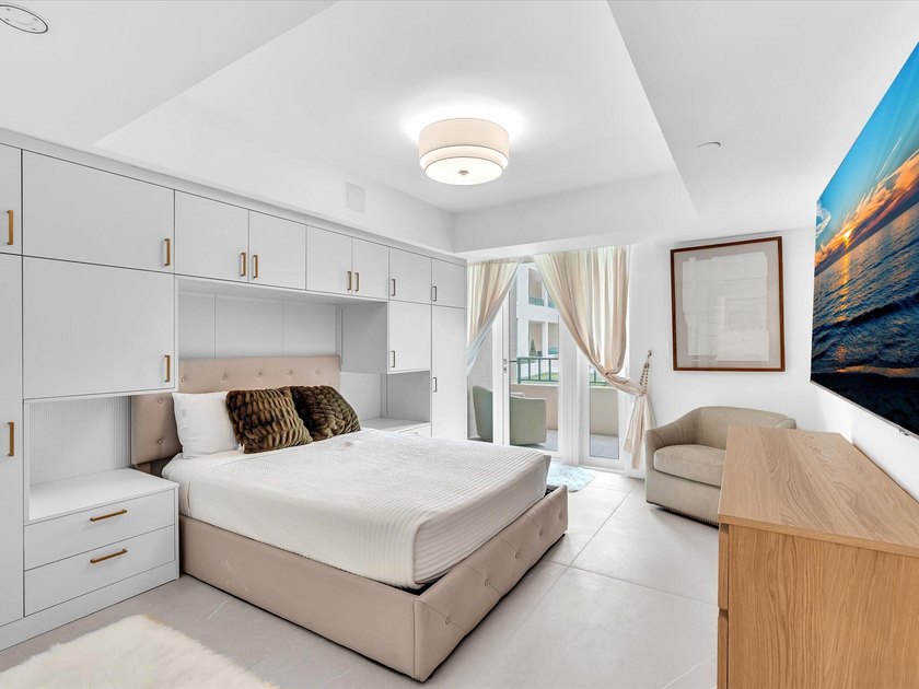Welcome to luxury waterfront living in downtown Boca. This - photo 20