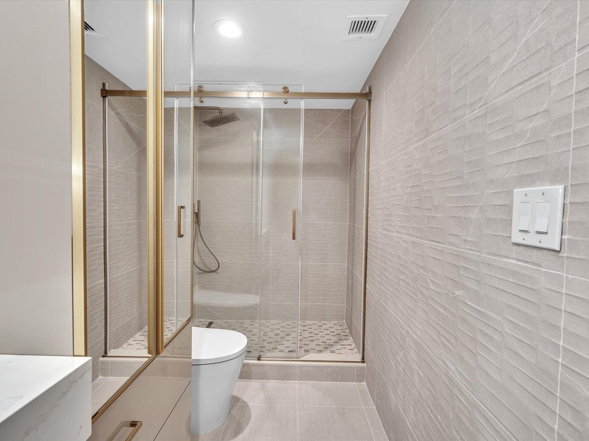 Welcome to luxury waterfront living in downtown Boca. This - photo 22