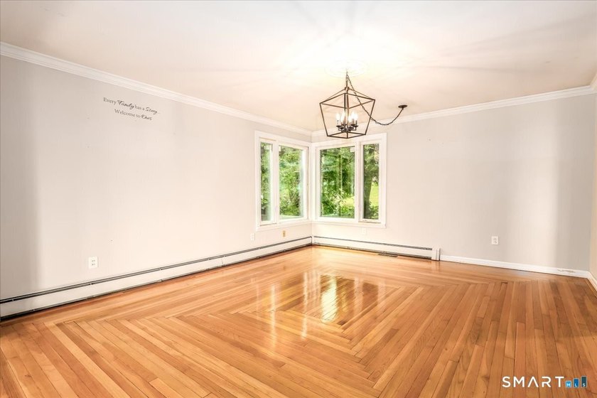 Welcome to this charming stone-front, 4-bedroom, 3-full-bath New - photo 8
