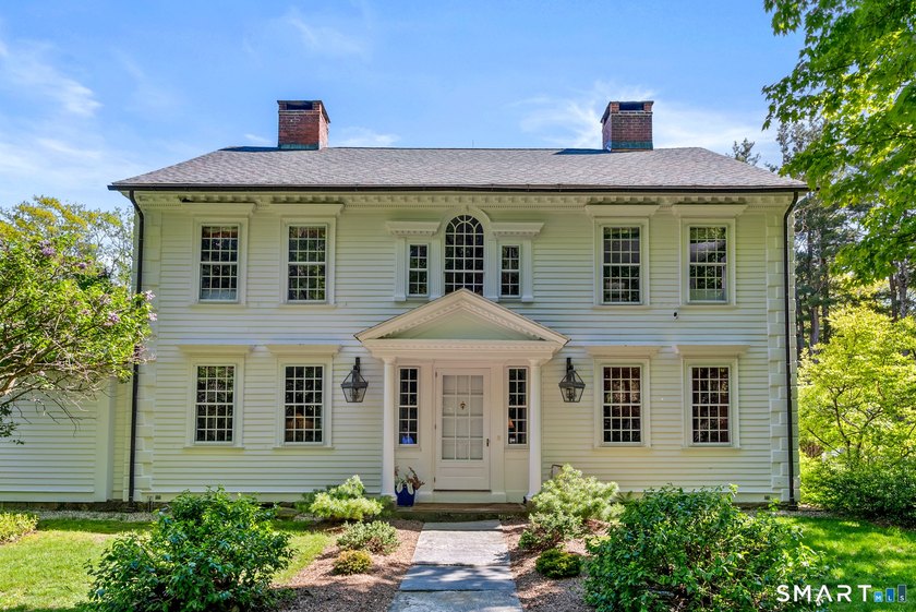 Nestled within the absolute privacy of the 1,700-acre Doolittle - photo 2