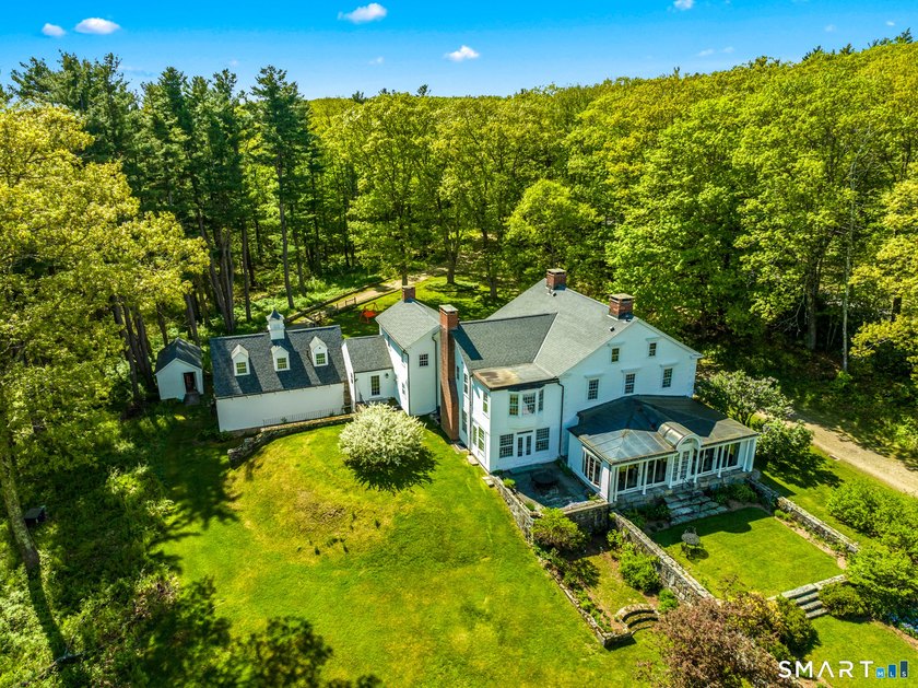 Nestled within the absolute privacy of the 1,700-acre Doolittle - photo 4