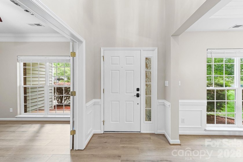 Welcome home to this stunning Hunter Oaks retreat featuring a - photo 7