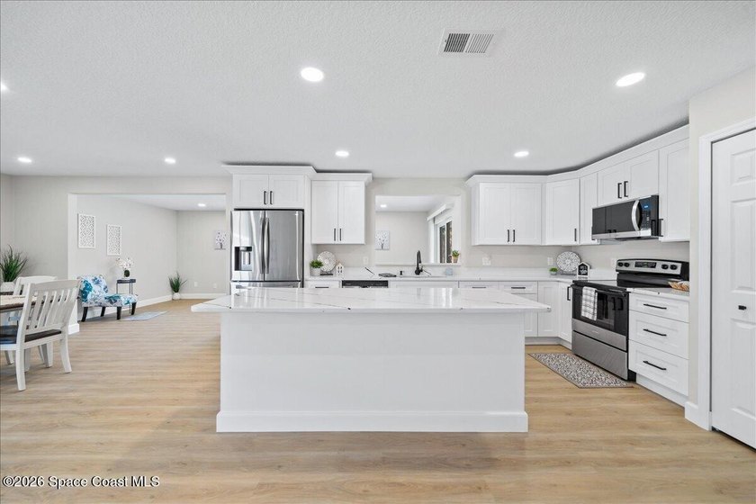 Brand New Roof! Welcome home to this beautifully renovated pool - photo 16