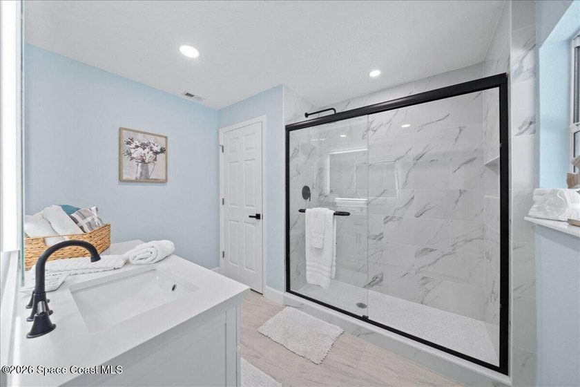 Brand New Roof! Welcome home to this beautifully renovated pool - photo 24